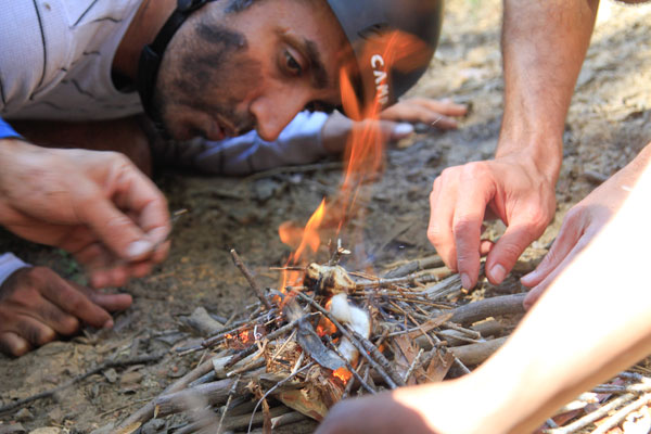 Lighting a camp fire