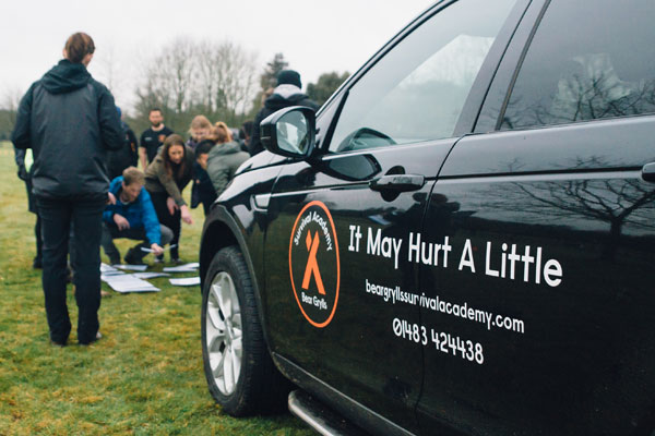 Bear Grylls Survival Academy session with 4x4 labelled "It may hurt a little"